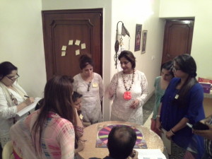 Neera Sareen explaining Angel Readings through Angel Oracle Board to her students 